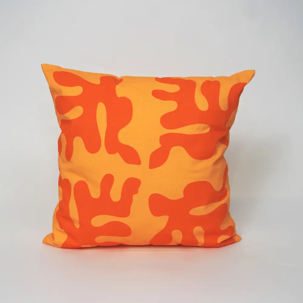 Korallklang cushion cover styled in a Stockholm living room